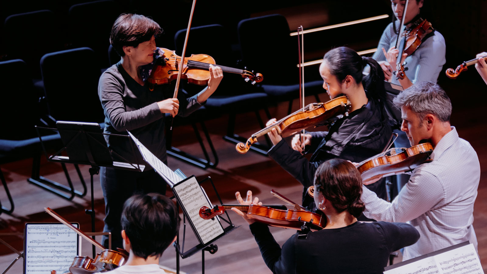ACO Violin Aiko Goto is pictured directing ACO Academy