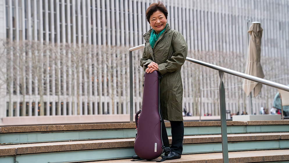 ACO Violinist Aiko Goto in front of the Lincoln Center.