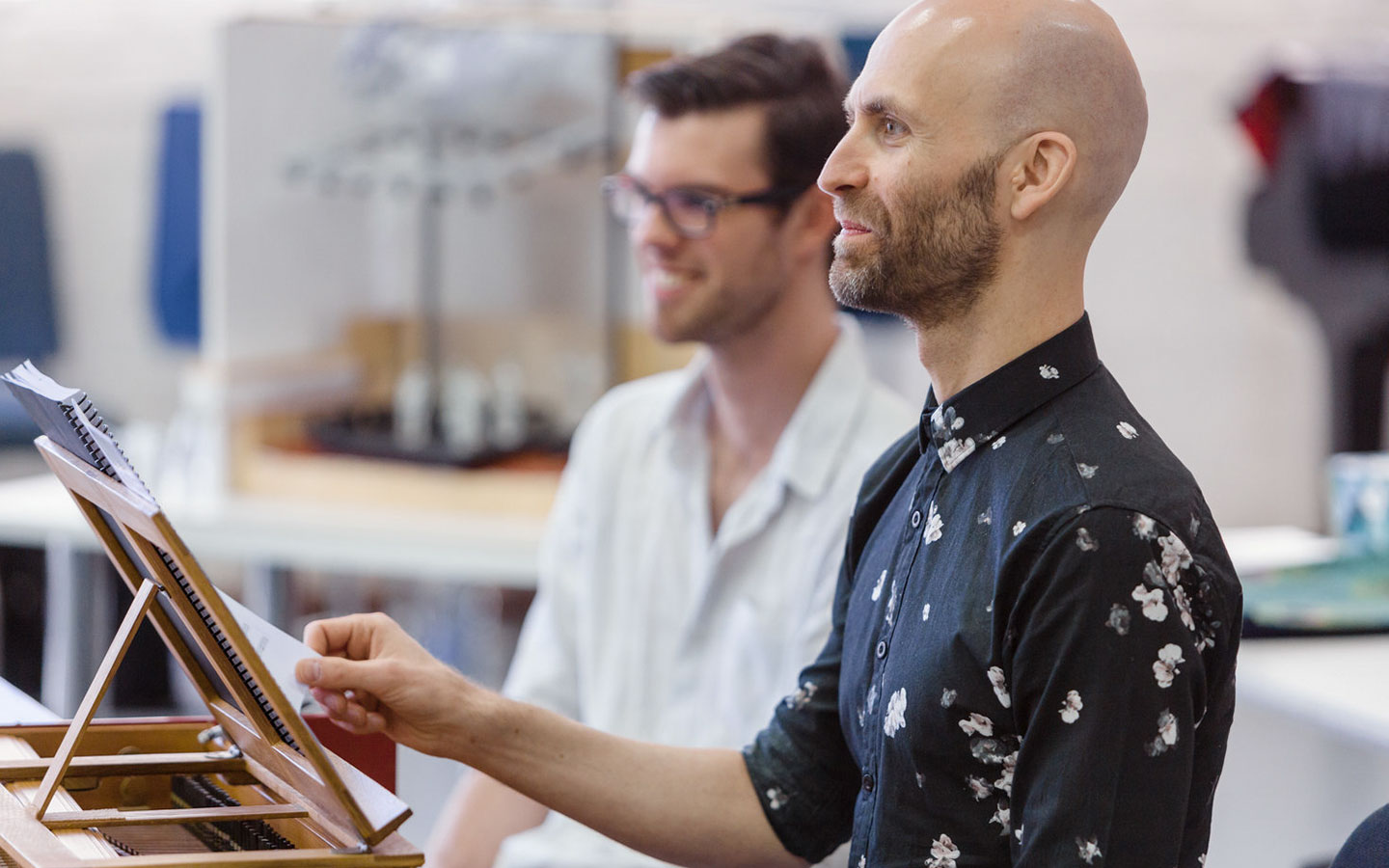 Erin Helyard turning a page during performance