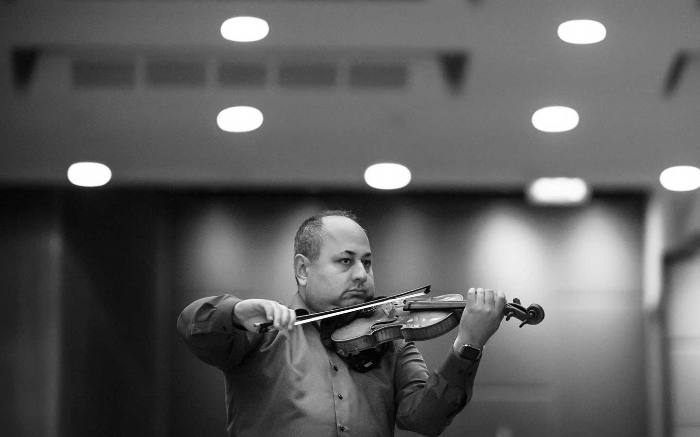 ACO Violinist Ilya Isakovich backstage