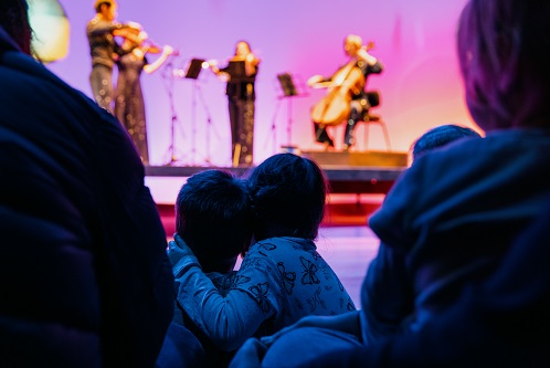 Young children enjoying ACO Family Show, How to Catch a Star