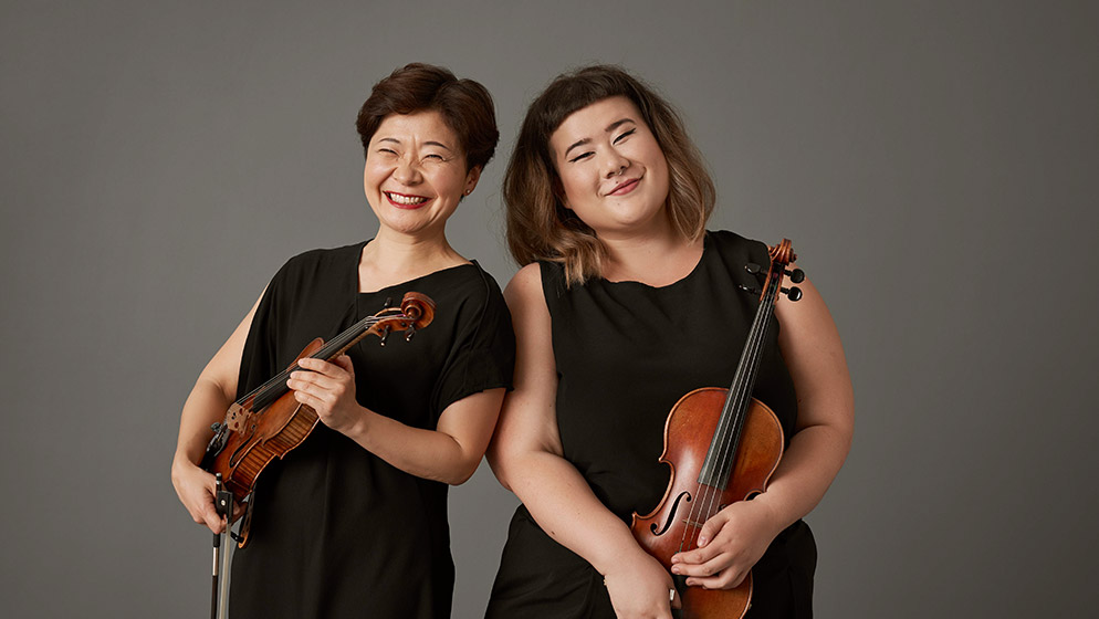 ACO violinist Aiko Goto with Emerging Artist Kyla Matsuura-Miller
