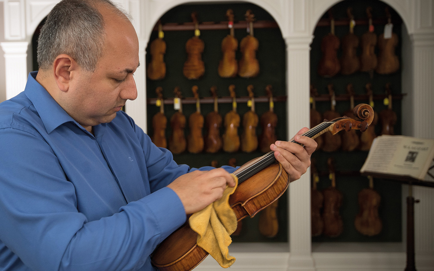 Ilya Isakovich with his violin. 