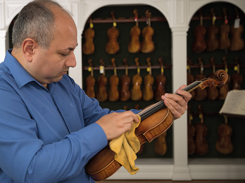 Ilya Isakovich with his violin. 