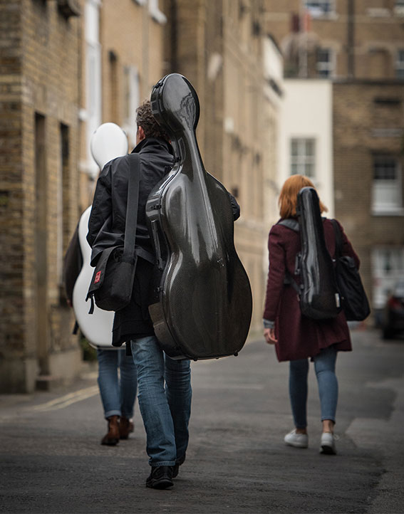 Photo of ACO Musicians walking the streets of London