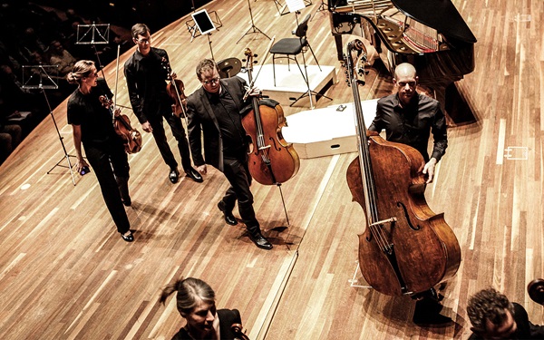 ACO Musicians walking off stage