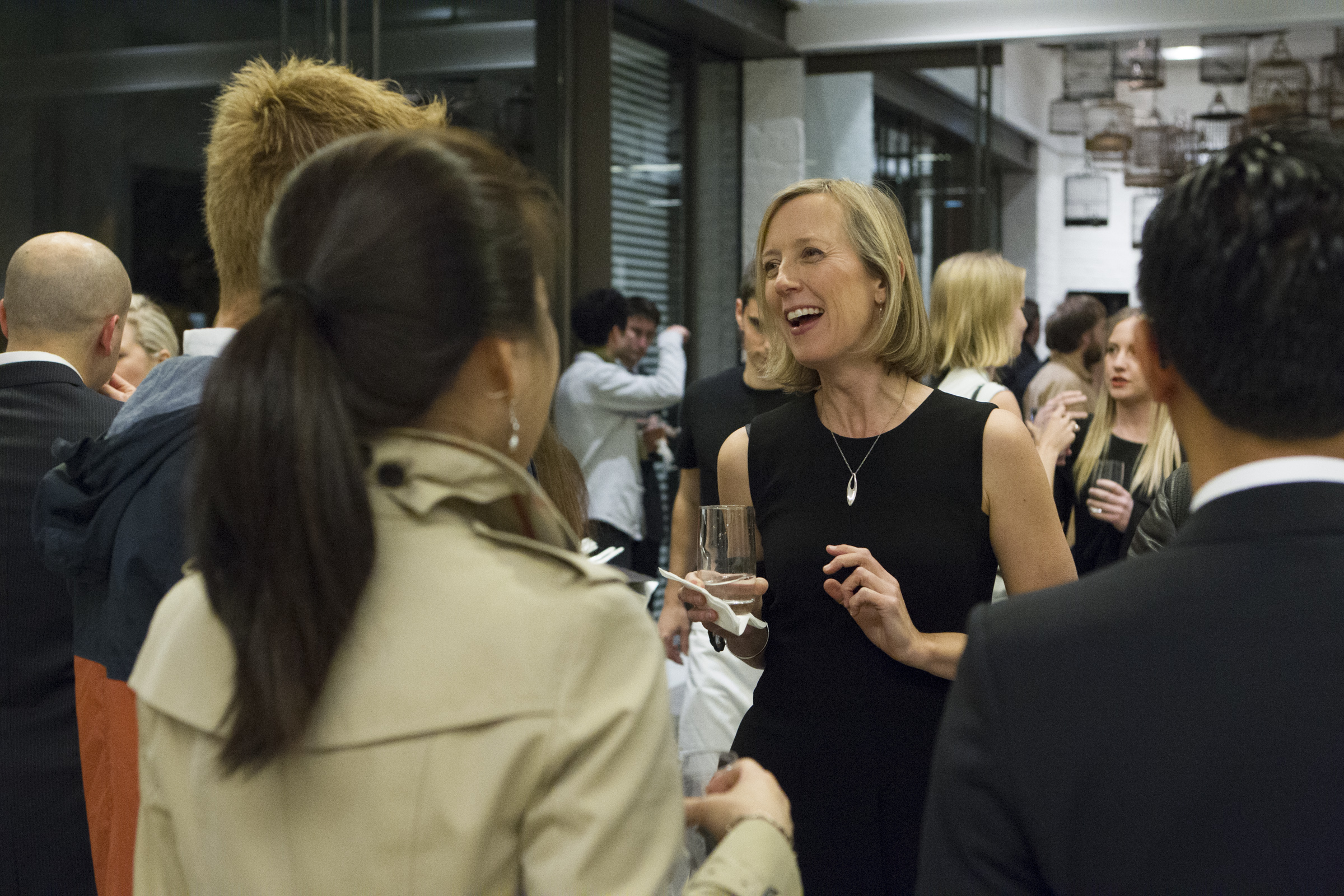 ACO cellist Melissa Barnard speaking with guests at an ACO Next function