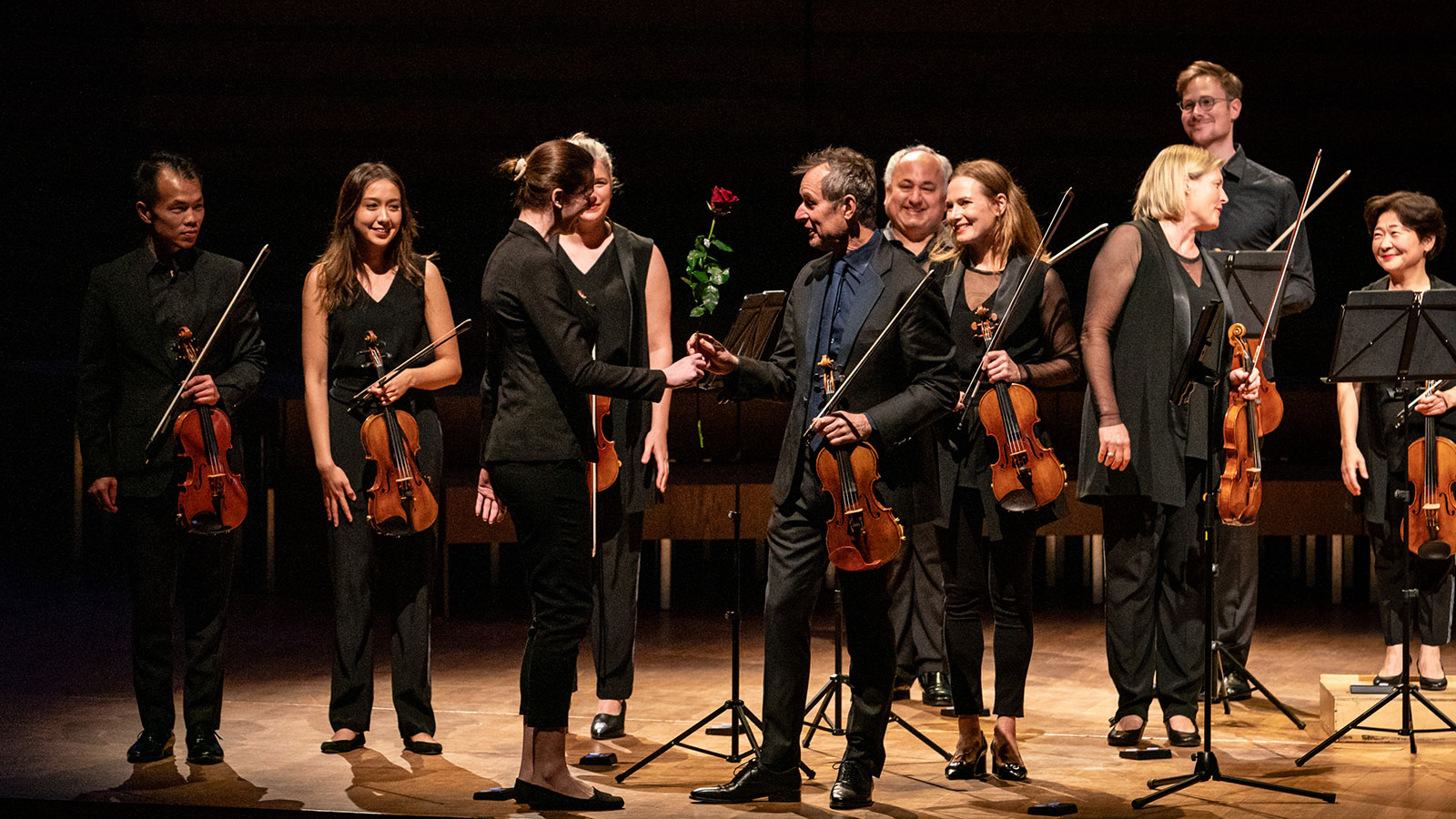 Richard Tognetti receives a rose in Poland