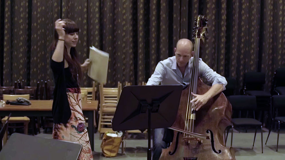 Principal Bass Maxime Bibeau and Missy Mazzoli working together on a newly commissioned piece of music